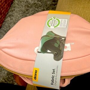 Used Doona canopy and shoulder pads in blush pink replacement.